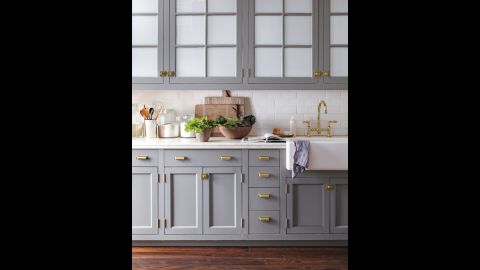 No need for a gut renovation. Revitalize your kitchen with a fresh paint color and stylish new hardware. We updated all white cabinets with a coat of gray and a sprinkling of brass. Martha Stewart's tip: When it comes to architectural details, don't mix metals. 