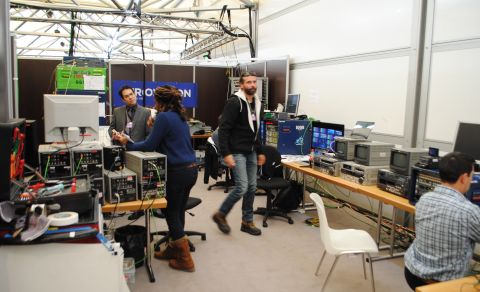 TV crews working upstairs at the Davos media centre. Behind the scenes Eurovision's technical support team at the Davos media centre. 