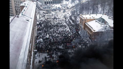 Ukrainian police storm protesters' barricades in Kiev amid violent clashes on January 22.