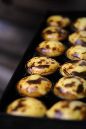 Portuguese custard tarts have conquered the world. You can try the original version (pictured) at the Antiga Confeitaria de Belem café.