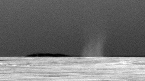 Both Spirit and Opportunity examined the frequency and dynamics of dust devils, which help scientists understand how wind moves dust and sand in a thin atmosphere. Spirit saw dozens of dust devils, but Opportunity, located halfway around the planet, likely never encountered one until more than six years into its mission. An image from July 15, 2010, shows a column of swirling dust.