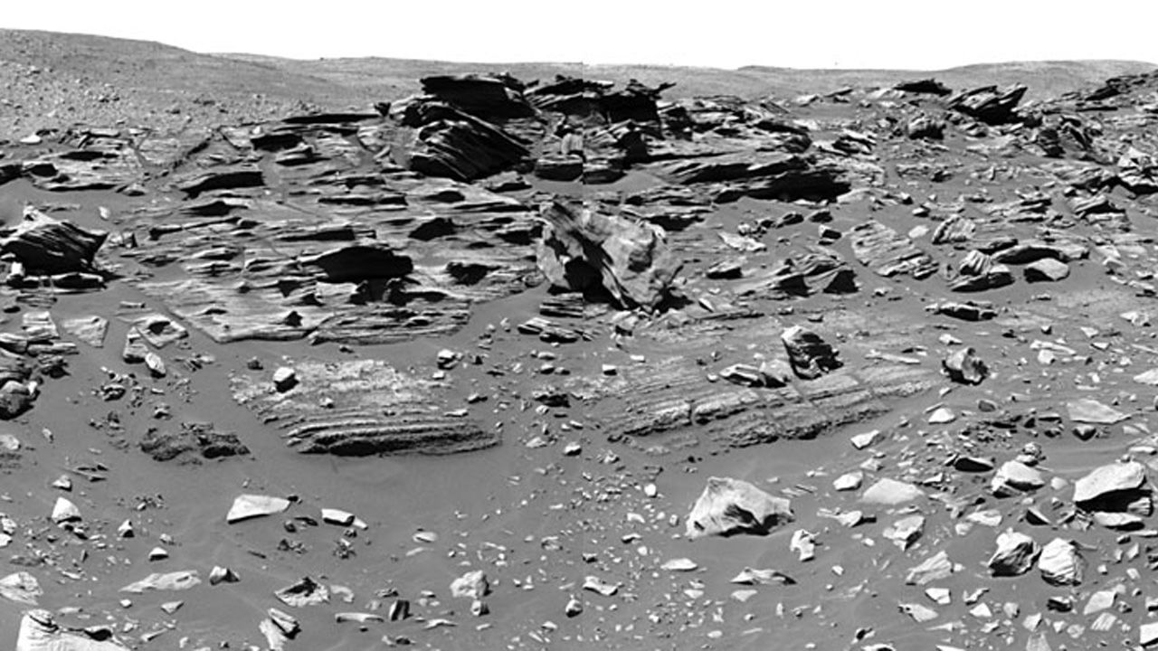 In February 2006, Spirit arrived at a geological feature called Home Plate, about 260 feet in diameter. It was so named because it looks like a baseball diamond's home plate from orbit. In this area, the rover found a material called opaline silica, a discovery important for understanding conditions that would have supported life on Mars. Scientists believe this material formed when water interacted with volcanic material known as with magma. 