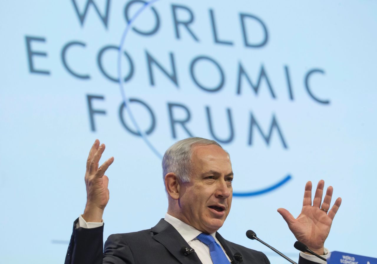 Prime Minister Binyamin Netanyahu addresses the forum on Thursday. His message: Investing in the Israeli economy is a way to facilitate peace in the region.