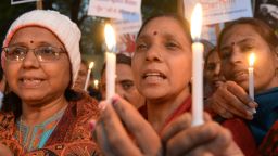 Indian demonstrators hold candles in honour of a physiotherapy student who was gang-raped and murdered at a protest to mark the one year anniversary of her death in New Delhi on December 29, 2013.