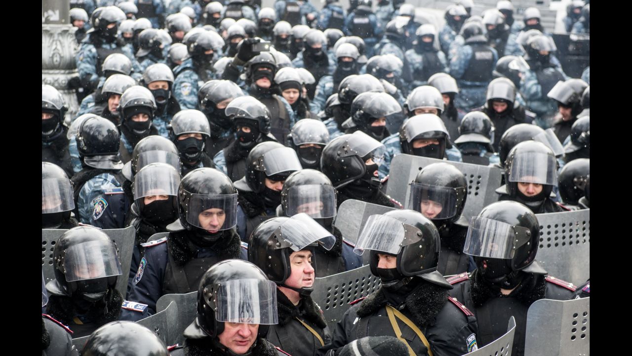 Riot police officers gather in Kiev on January 23.