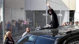 MIAMI, FL - JANUARY 23:  Justin Bieber waves after exiting from the Turner Guilford Knight Correctional Center on January 23, 2014 in Miami, Florida. Justin Bieber was charged with drunken driving, resisting arrest and driving without a valid license after Miami Beach police found the pop star street racing Thursday morning.  (Photo by Joe Raedle/Getty Images)