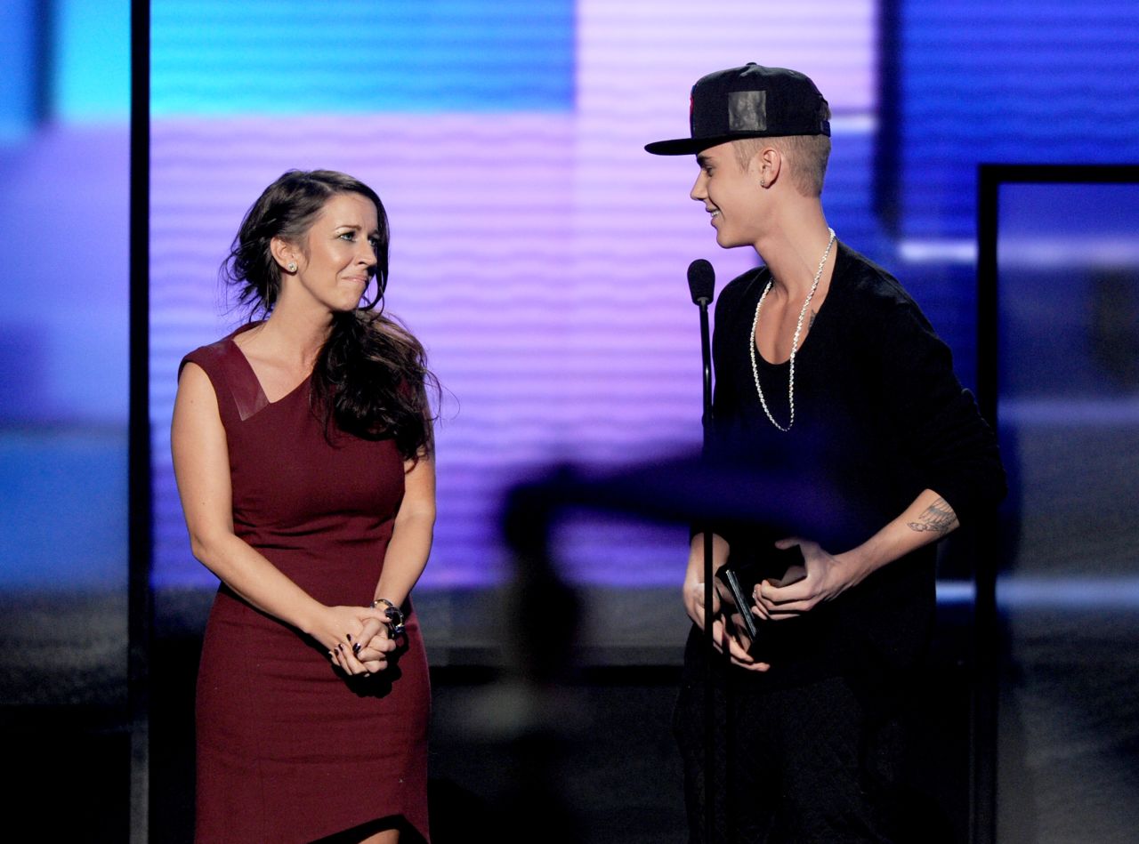 Bieber and his mother, Pattie Mallette, are widely known to have a close relationship, with Biebs never being shy about bringing mom to awards shows. Here, she joins him on stage as he accepts the 2012 American Music Award for Artist of the Year. 