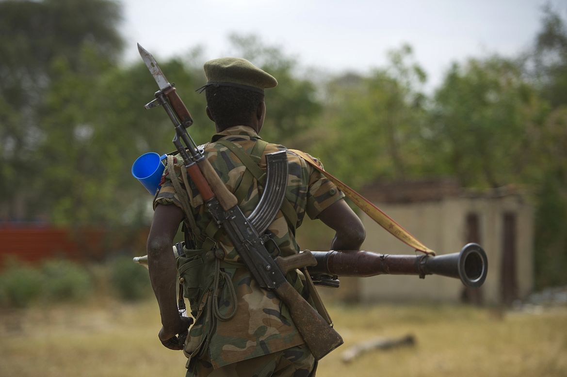 A South Sudanese People's Liberation Army soldier patrols in Malakal on Tuesday, January 21.