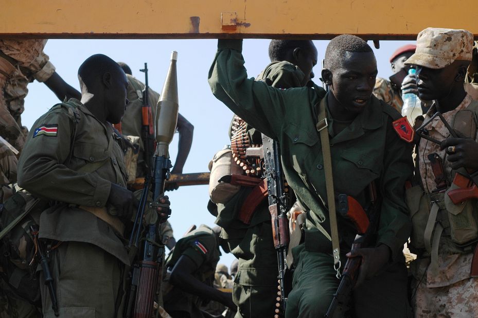 Government soldiers prepare to deploy from Juba on January 13 as fighting continues to rage in South Sudan. 