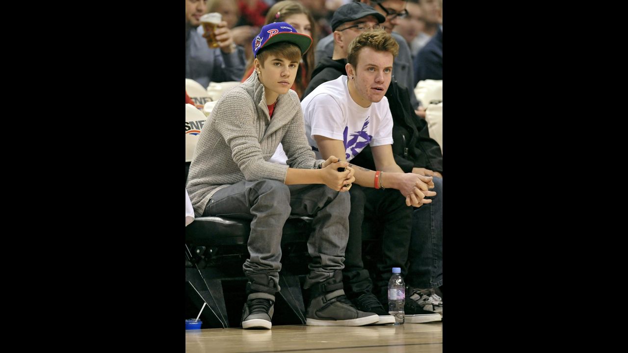 Even as he's become astronomically famous, Bieber hasn't lost touch with his Canadian childhood friends. Ryan Butler (pictured right in 2011) is a familiar face to Beliebers both on and off the red carpet, and he considers Bieber a brother. On Twitter, you'll often catch him offering Bieber supportive tweets <a href="https://twitter.com/itsRyanButler/status/408328997294989314" target="_blank" target="_blank">like this one</a>. 