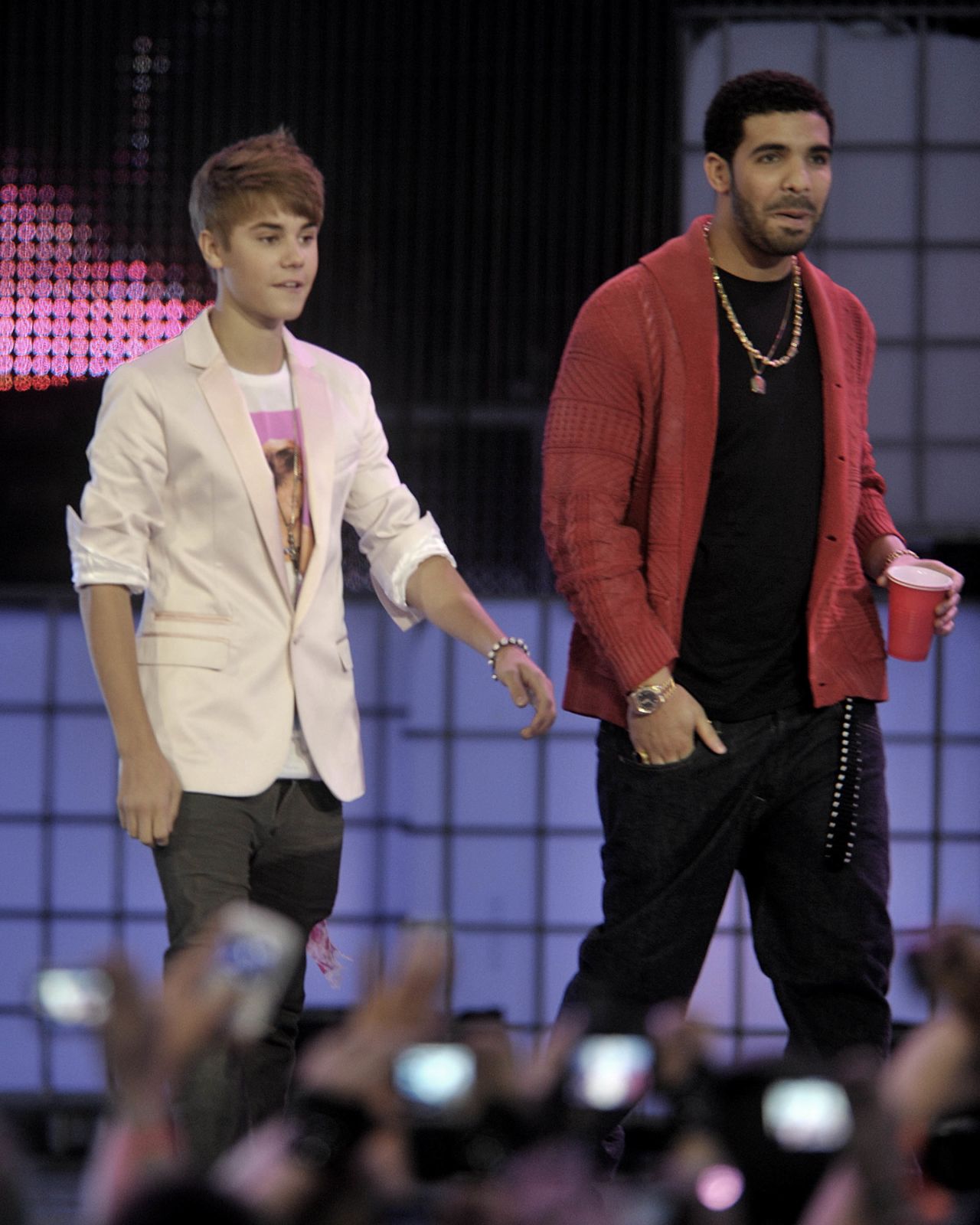 Drake, seen here with Bieber in 2011, is another star who's taken the young singer under his wing. According to Braun, Drake is one of the first people to rip into Bieber after spotting a tawdry headline about him in the news. "He'll text me, like, 'What the hell is going with this? I'm pissed. I'm calling him right now. I'm about to go in on him,' " <a href="http://www.hollywoodreporter.com/news/justin-bieber-reveals-will-smith-657535" target="_blank" target="_blank">Braun told THR</a> in 2013.