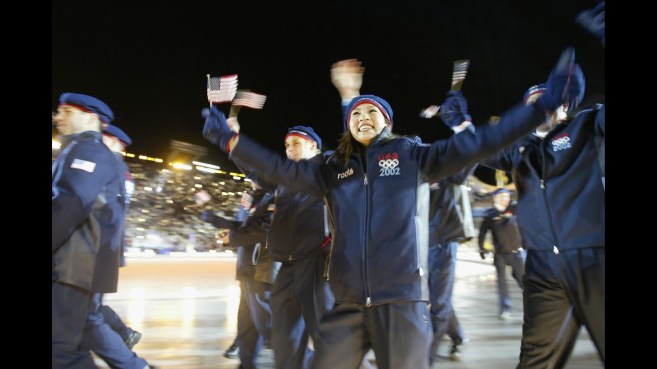 U.S. athletes at the 2002 Winter Olympics in Salt Lake City, Utah. Here, figure skater Michelle Kwan waves to the crowd at the opening ceremony 