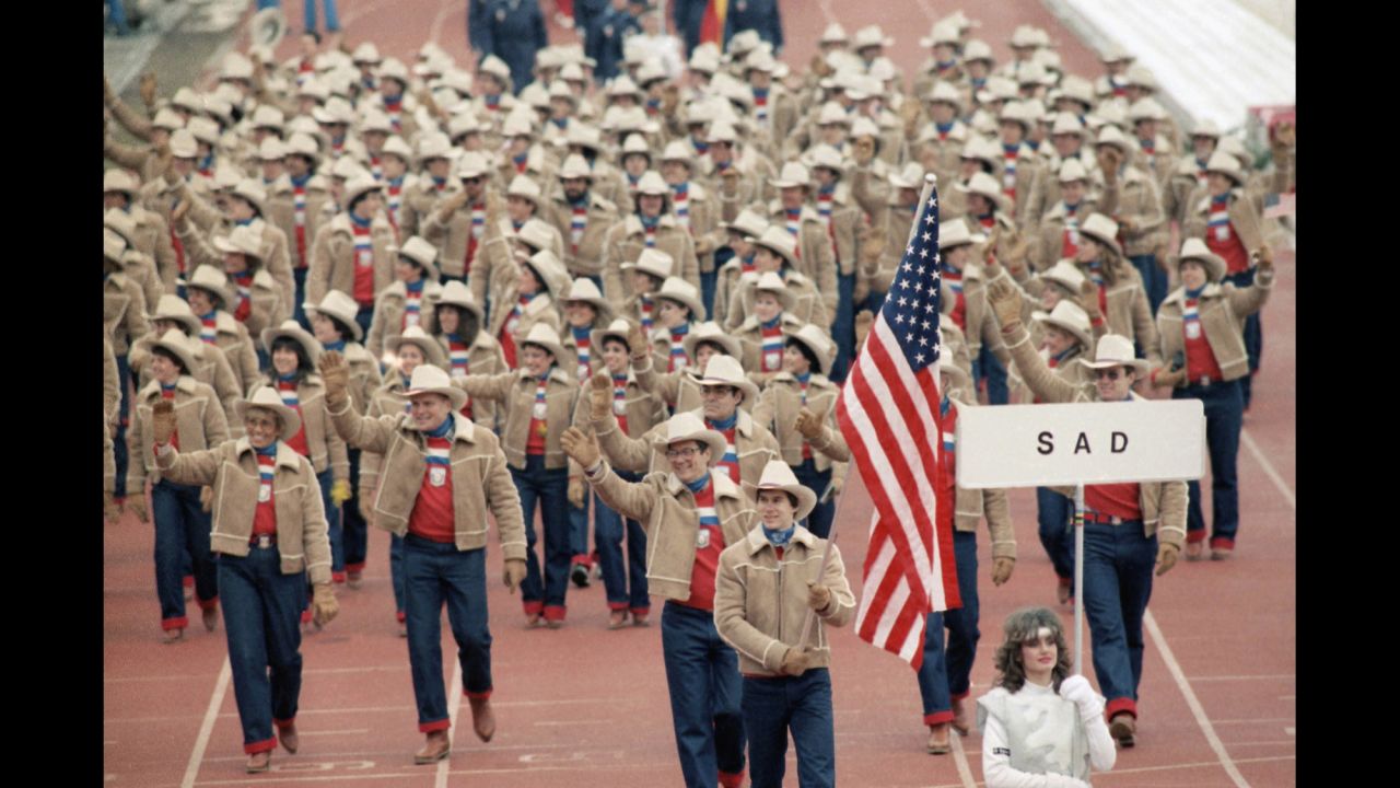 U.S. athletes at the 1984 Winter Olympics in Sarajevo in what was then Yugoslavia. Luger Frank Masley carries the American flag here.