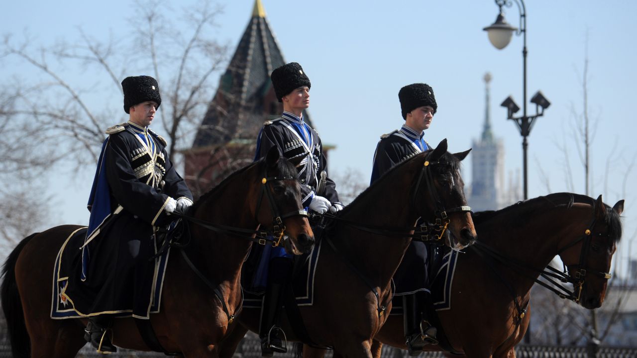 Cossacks also participate in ceremonial events, including this presidential regiment ride in the Kremlin following the changing of the guard ceremony in the Sobornaya (Cathedral) Square. The tsarist-style ceremony was restored by the Kremlin in 2007 to attract tourists.  