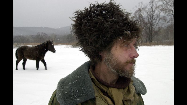 A Cossack settler stands in Pagran-Petrovka in Russia's Far East near the border with China in January 2001.  Russia deployed a chain of Cossack border guards to prevent Chinese citizens from crossing the border illegally.   