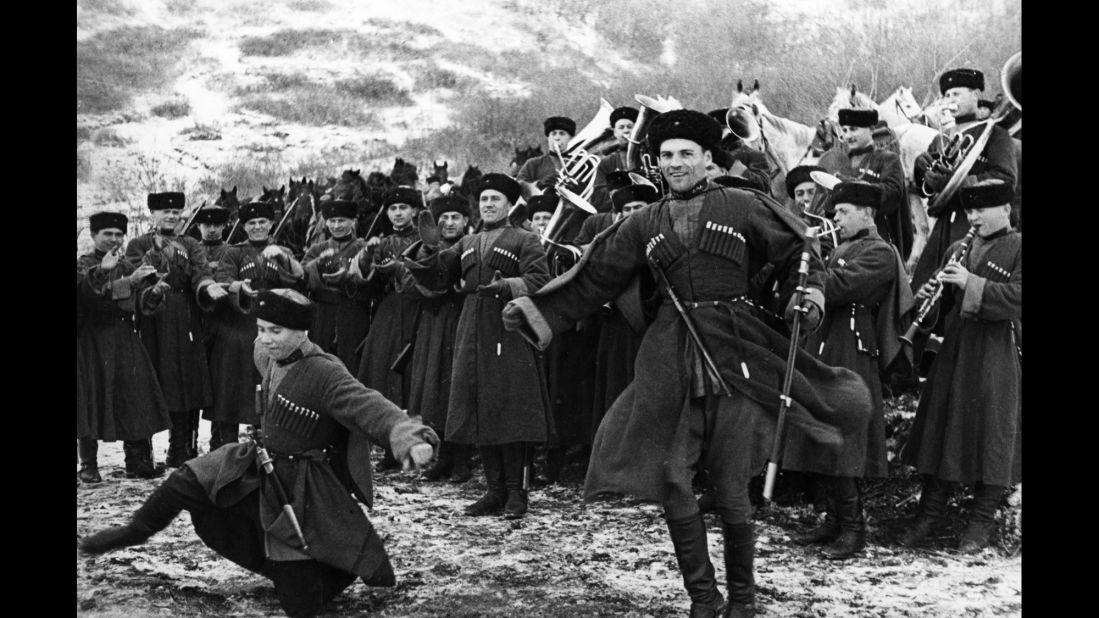 Soviet Red Army Cossacks enjoy a little downtime by giving a traditional dance performance in February 1938. 