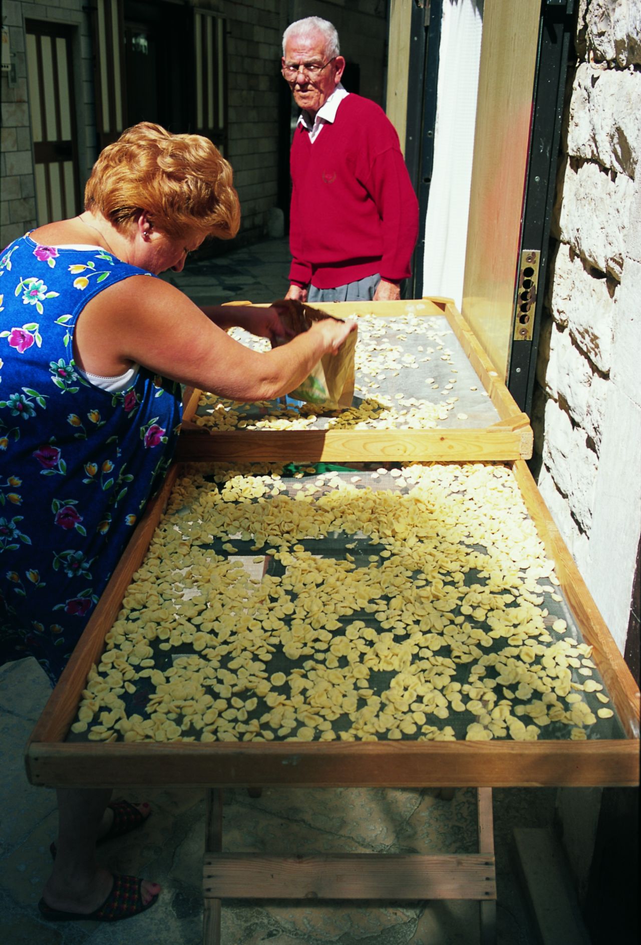 Puglia is Italy's breadbasket, wheat and olive oil being produced there in abundance. Orecchiette means "little ears."