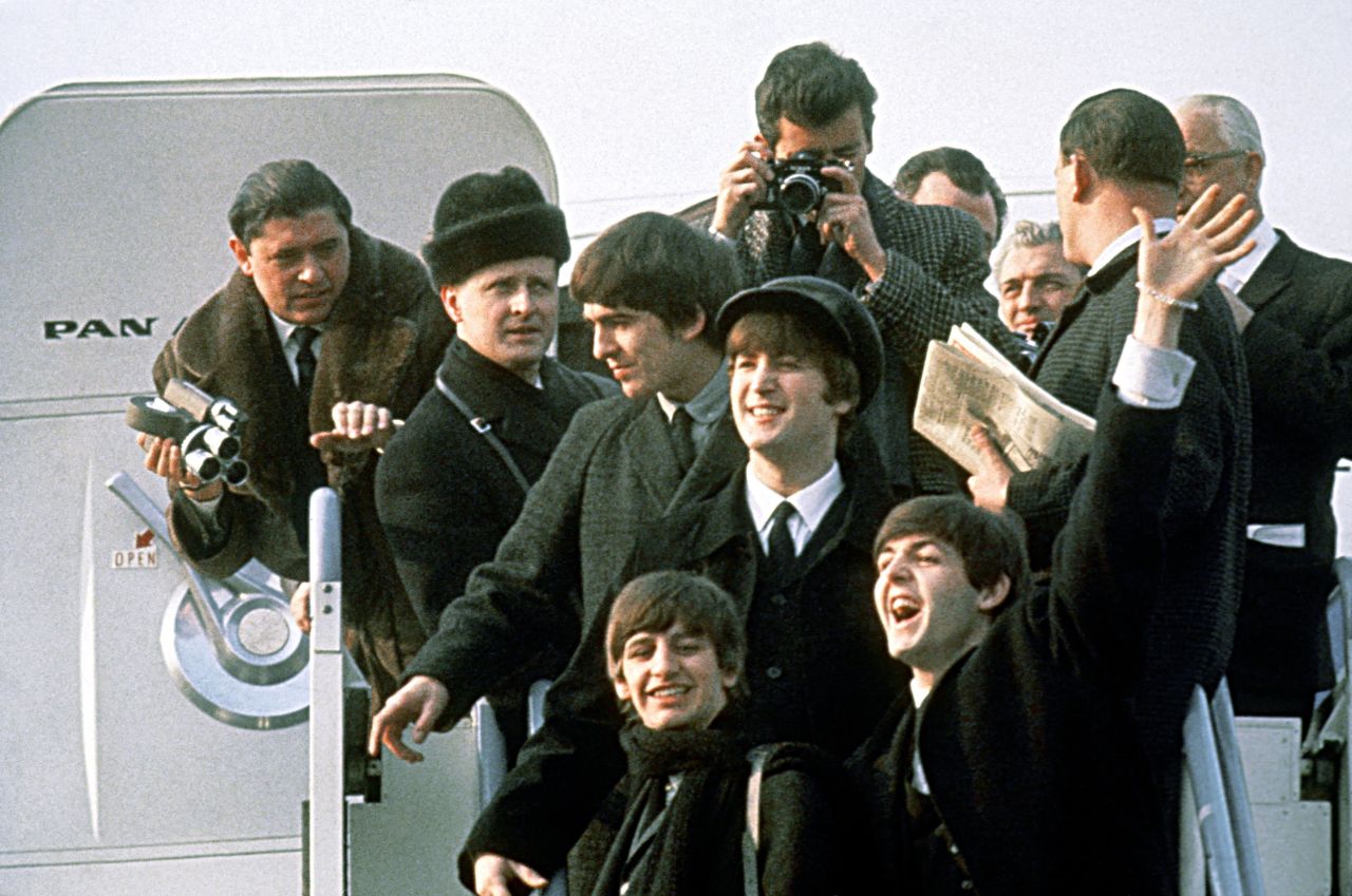 The Beatles arrive in New York on February 7, 1964. The band from Liverpool, England, already had the No. 1 U.S. single, "I Want to Hold Your Hand," but its U.S. visit confirmed that "Beatlemania" had made its way across the pond.