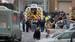 Police evacuate employees and patrons from the Columbia Town Center Mall after a shooting resulting in fatalities there on January 25 in Columbia, Maryland.
