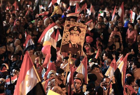 Supporters of Abdel-Fattah el-Sisi, Egypt's minister of defense, gather at Tahrir Square to mark the anniversary. 