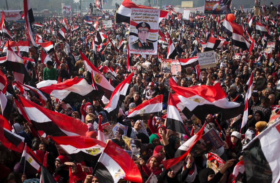 Pro-military demonstrators wave national flags and hold pictures of Defense Minister Abdel-Fattah el-Sisi, who was a key figure in the ouster last summer of democratically elected President Mohamed Morsy, and who recently hinted at a run for the presidency himself. 