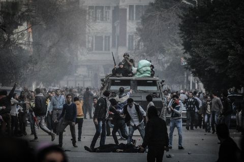 Egyptian police fire tear gas to disperse hundreds of supporters of ousted President Mohammed Morsy.