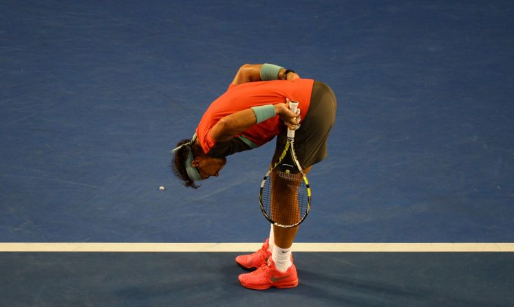 Nadal received a time violation warning from umpire Carlos Ramos early on in the second set. Soon after, Nadal was clutching his back and calling for the trainer.