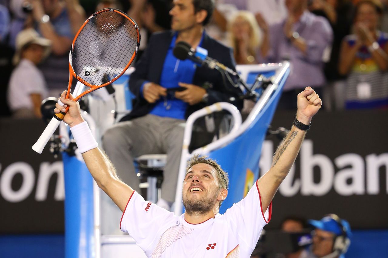Stanislas Wawrinka savors the moment of victory in Melbourne after recording a dramatic victory over world no. 1 Rafael Nadal in 2014.