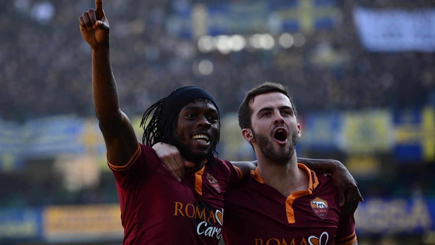 Roma striker Gervinho (left) celebrates with teammate Miralem Pjanic after scoring in a 3-1 win against Hellas Verona.