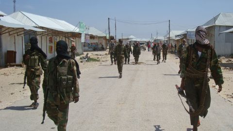 Al-Shabaab recruits walk in the Somali capital, Mogadishu, after their graduation on March 5, 2012. 
