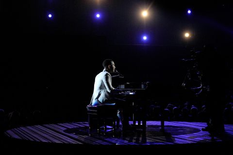 John Legend takes center stage to perform his ballad "All of Me."