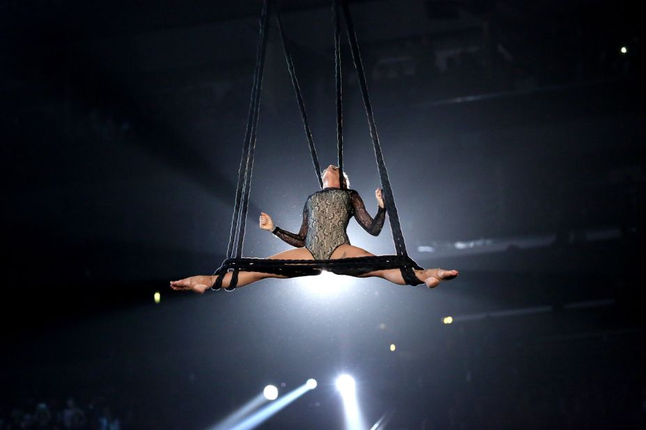 Pink shows off her aerial acrobatics while performing "Just Give Me a Reason." She opened her set with the song "Try."