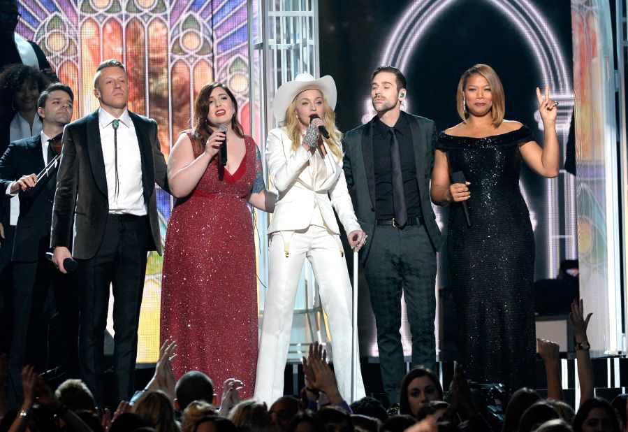 From right, Queen Latifah, Ryan Lewis, Madonna, Mary Lambert and Macklemore share the stage. Madonna sang her classic "Open Your Heart."