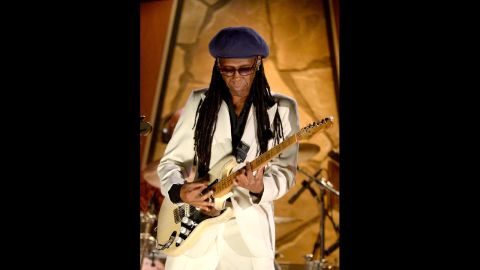 Musician Nile Rodgers topped off his sparkling white suit with a blue beret -- you know, just to keep it funky. 