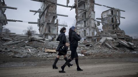 Two Chechen women walk in the outskirts of Grozny on March 7, 2011.