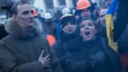 KIEV, UKRAINE - JANUARY 27: Ruslana Lyzhychko, the 2004 Eurovision Song Contest winner, sings the Ukrainian national anthem on Grushevskogo Street on January 27, 2013 in Kiev, Ukraine. Unrest is spreading across Ukraine, with activists taking over municipal buildings in several towns and cities including the east of the country where President Viktor Yanukovych has enjoyed strong support. (Photo by Rob Stothard/Getty Images)
