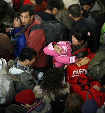 Chinese New Year (CNY) is an exercise in excess, starting with the train ride back home -- along with 225 million other people. The author's ride from Shenzhen to Jiujiang took 15 hours and included a (common) delay of several hours.