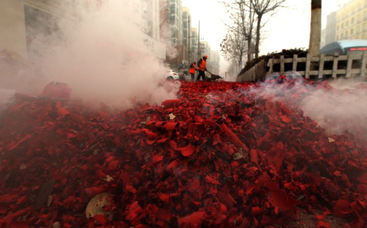 Firecrackers as loud as rifle shots explode throughout CNY to ward off evil spirits. Unfortunately the "evil spirits" don't include hangovers. 