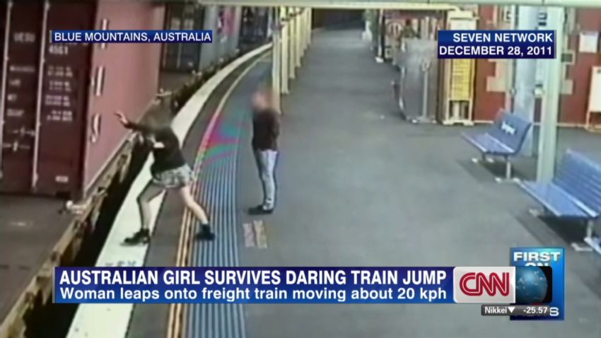 Woman Jumps Onto Moving Freight Train Cnn