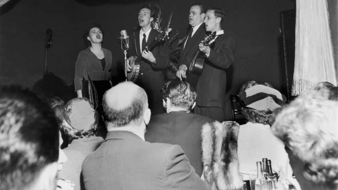 Seeger, center, performs with his group, the Weavers, at the Blue Angel nightclub in New York, circa 1948.