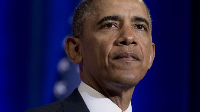 President Barack Obama pauses while talking about National Security Agency (NSA)surveillance, Friday, Jan. 17, 2014, at the Justice Department in Washington.Seeking to calm a furor over U.S. surveillance, the president called for ending the government's control of phone data from hundreds of millions of Americans and immediately ordered intelligence agencies to get a secretive court's permission before accessing the records. (AP Photo/Carolyn Kaster)