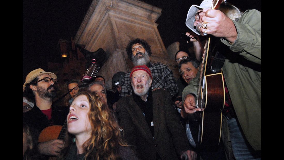 Seeger sings with Occupy Wall Street protesters in October 2011 in New York City.