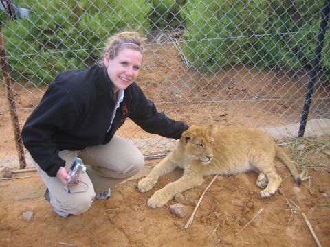 She wants to travel. Smith traveled to Europe and Africa with her college choir. Here she is petting a lion cub at an animal reserve outside of Cape Town, South Africa, in 2005. She'd like to go to Australia to visit her pen pal of 15 years, too.