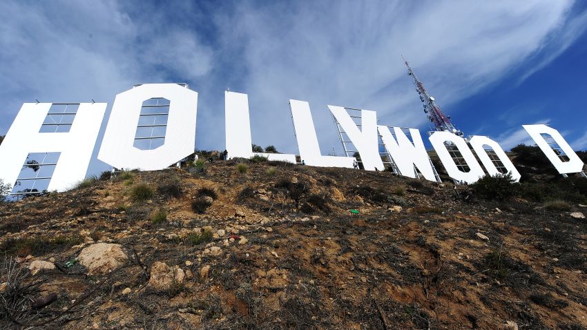 The freshly painted Hollywood Sign is seen after a press conference to announce the completion of the famous landmark's major makeover, December 4, 2012 in Hollywood, California. Some 360 gallons (around 1,360 liters) of paint and primer were used to provide the iconic sign with it most extensive refurbishment in almost 35 years in advance of it's 90th birthday next year. AFP PHOTO / Robyn Beck (Photo credit should read ROBYN BECK/AFP/Getty Images)