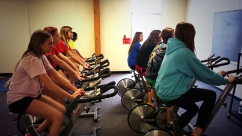 Students at  at Merton Intermediate School in Wisconsin participate in a spin class. 