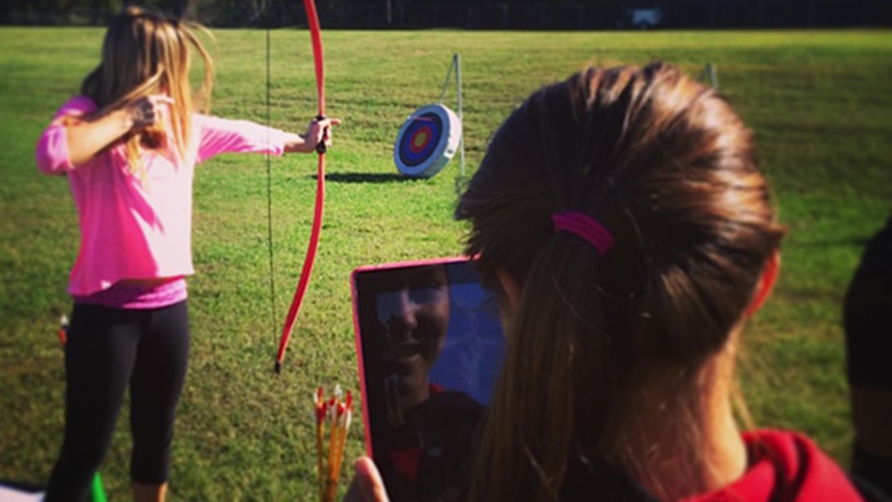 Students at Merton Intermediate School in Wisconsin analyze their archery skills using an iPad.