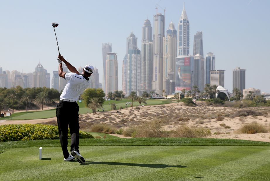 Tiger Woods tees off at the eighth as the Dubai Desert Classic celebrates its 25th year by inviting all former winners to compete in Tuesday's Champions Challenge -- a warm-up event to Thursday's main event. 