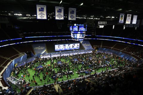 People attend Super Bowl XLVIII media day at the Prudential Center in Newark, New Jersey, on Tuesday, January 28.