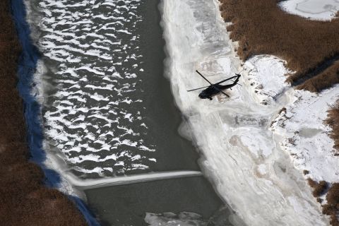 A Black Hawk helicopter flies near MetLife Stadium on January 28. Customs and Border Protection agents are helping to secure the area for the Super Bowl.