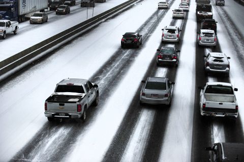 Traffic travels along the highway near downtown Birmingham on January 28.